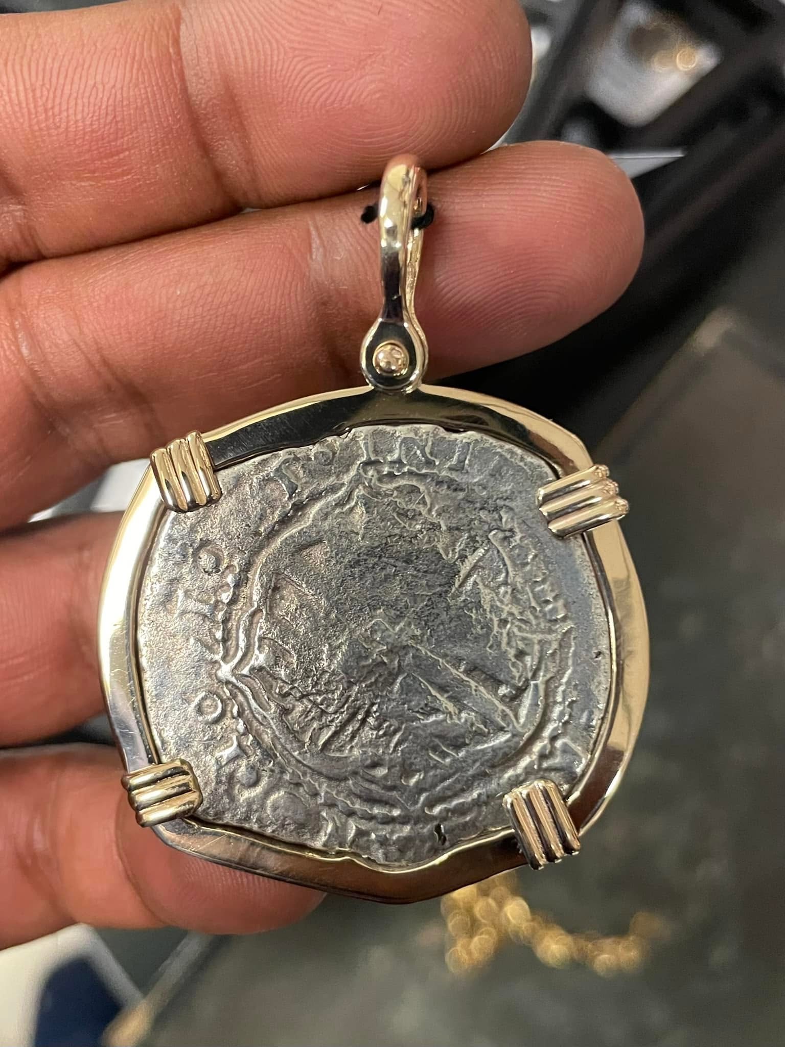 Historic coin pendant in gold setting