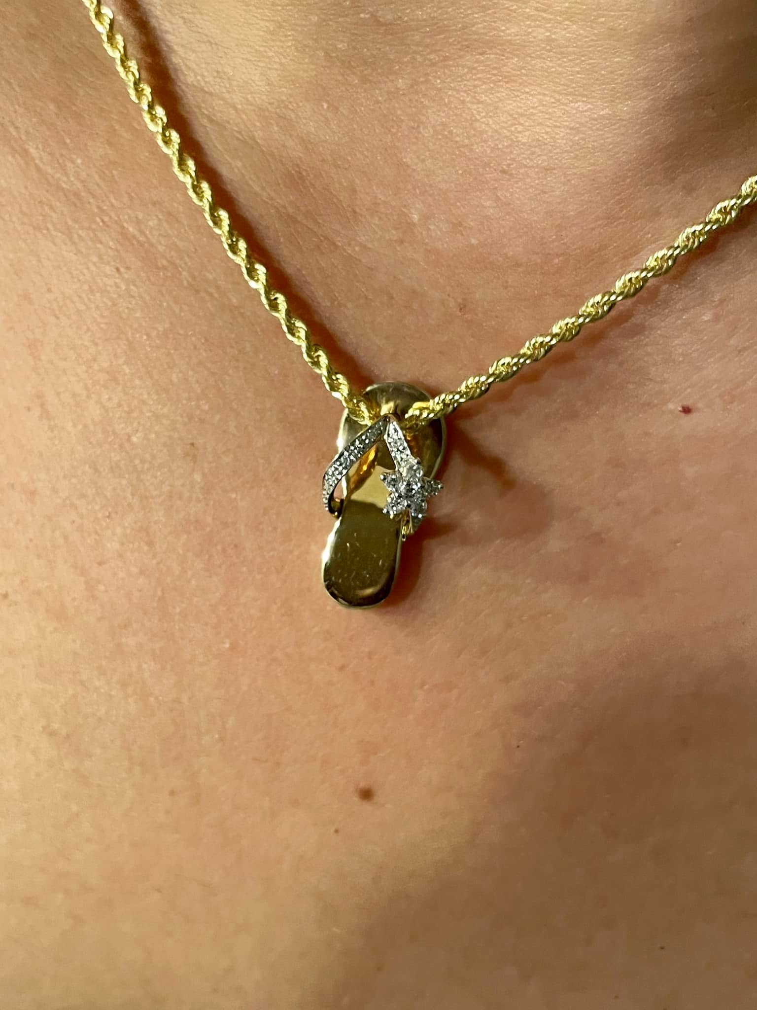 Gold sandal pendant necklace with diamond strap